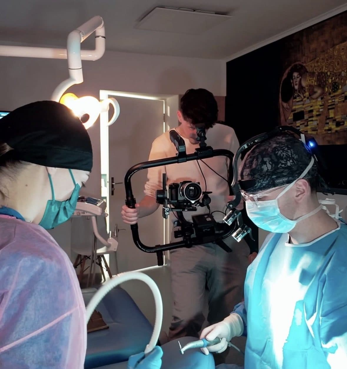 Halász Hunor filming a live implant surgery with a gimbal rig
